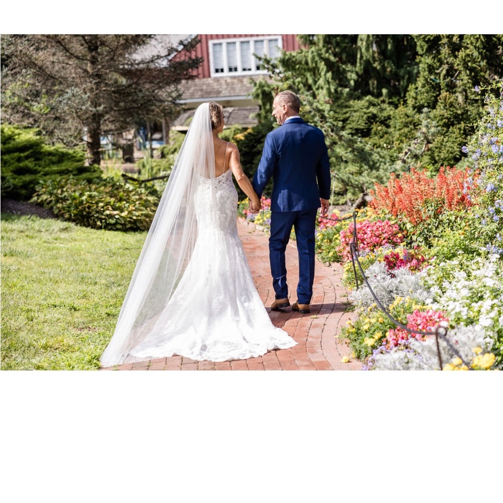 Cathedral length wedding veil lined‎ with beautiful, small rhinestones